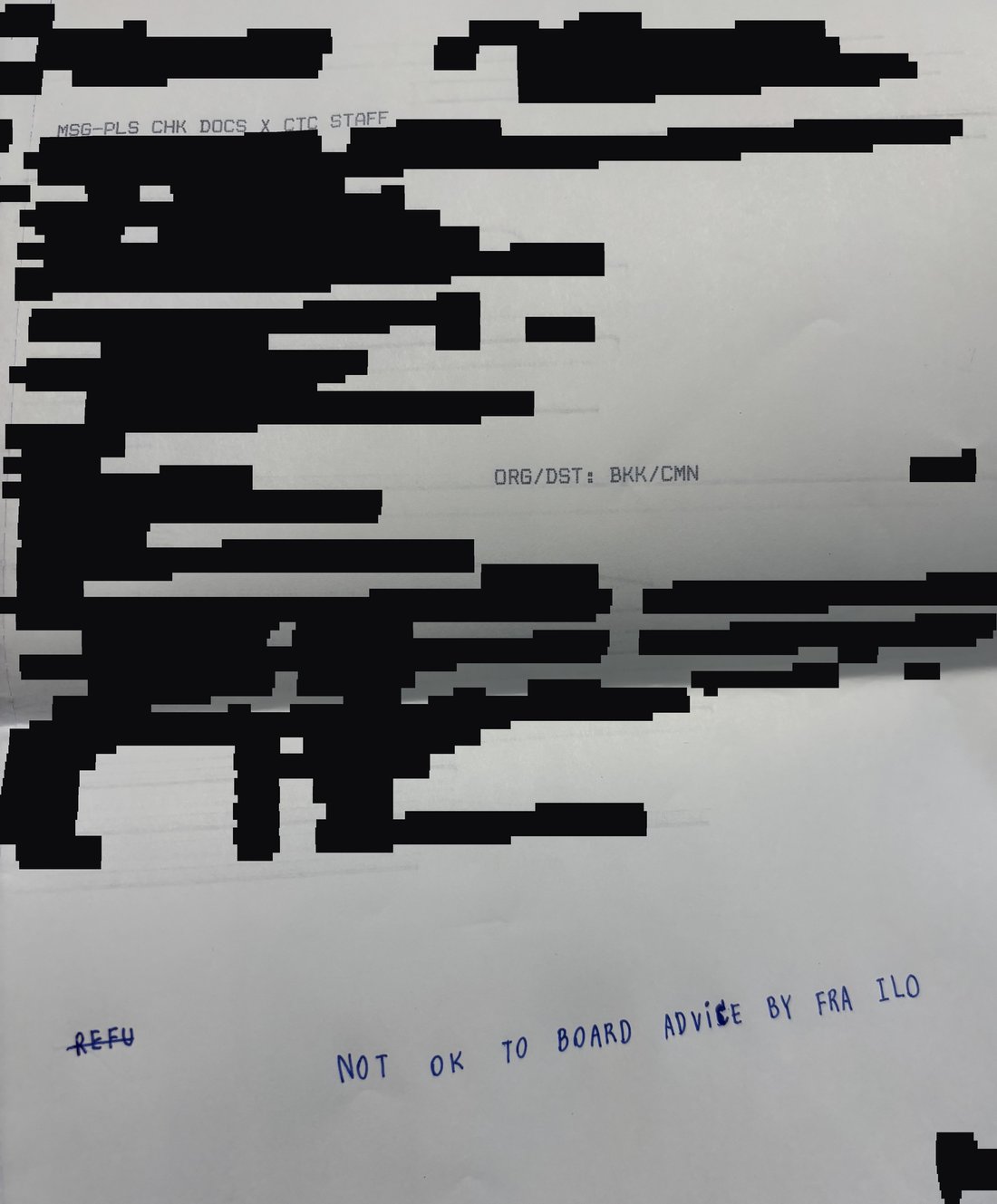 Document d'enregistrement masqué portant la mention manuscrite NOT OK TO BOARD ADVICE BY FRA ILO